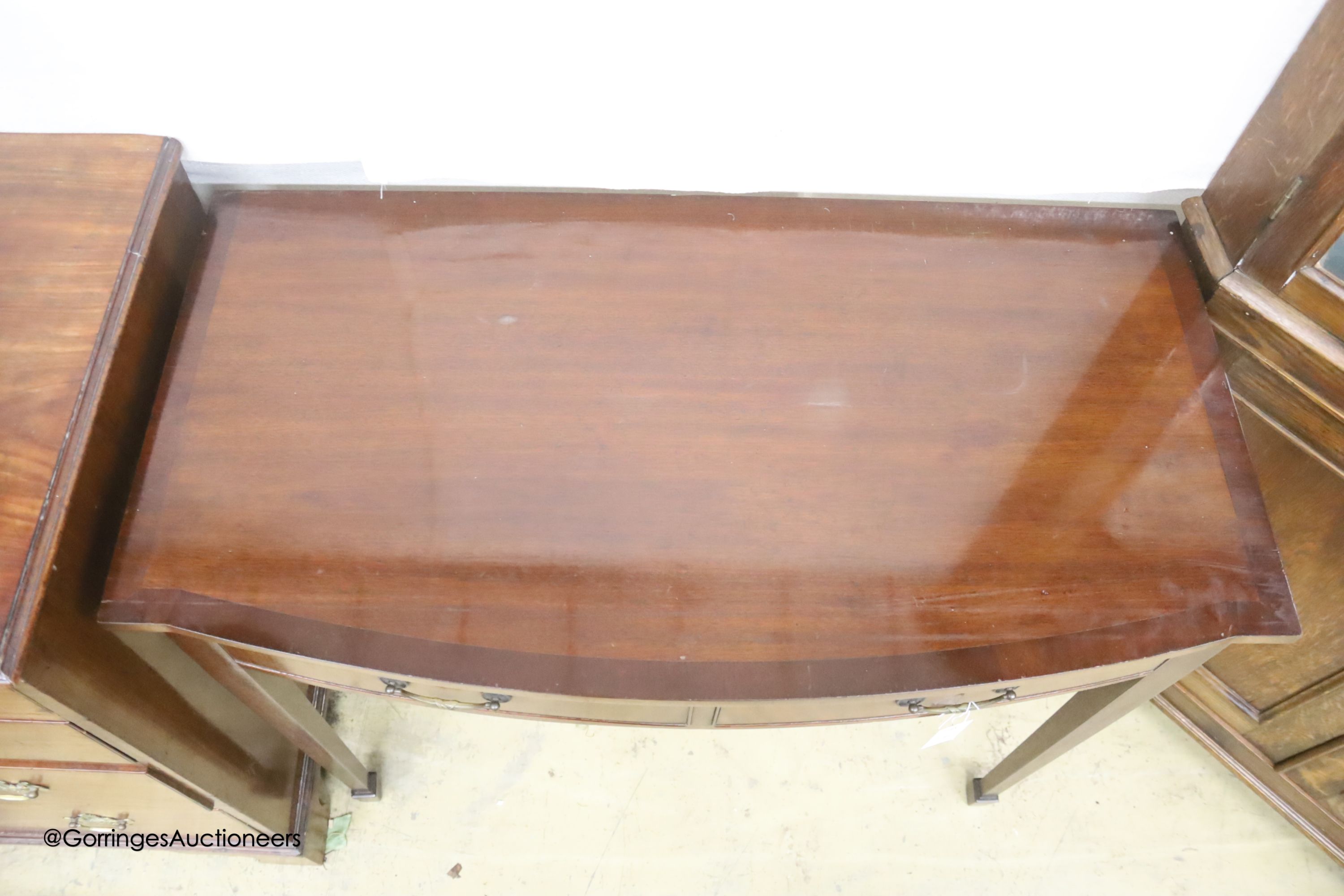A George III style mahogany bow-fronted side table, width 99cm, depth 52cm, height 86cm